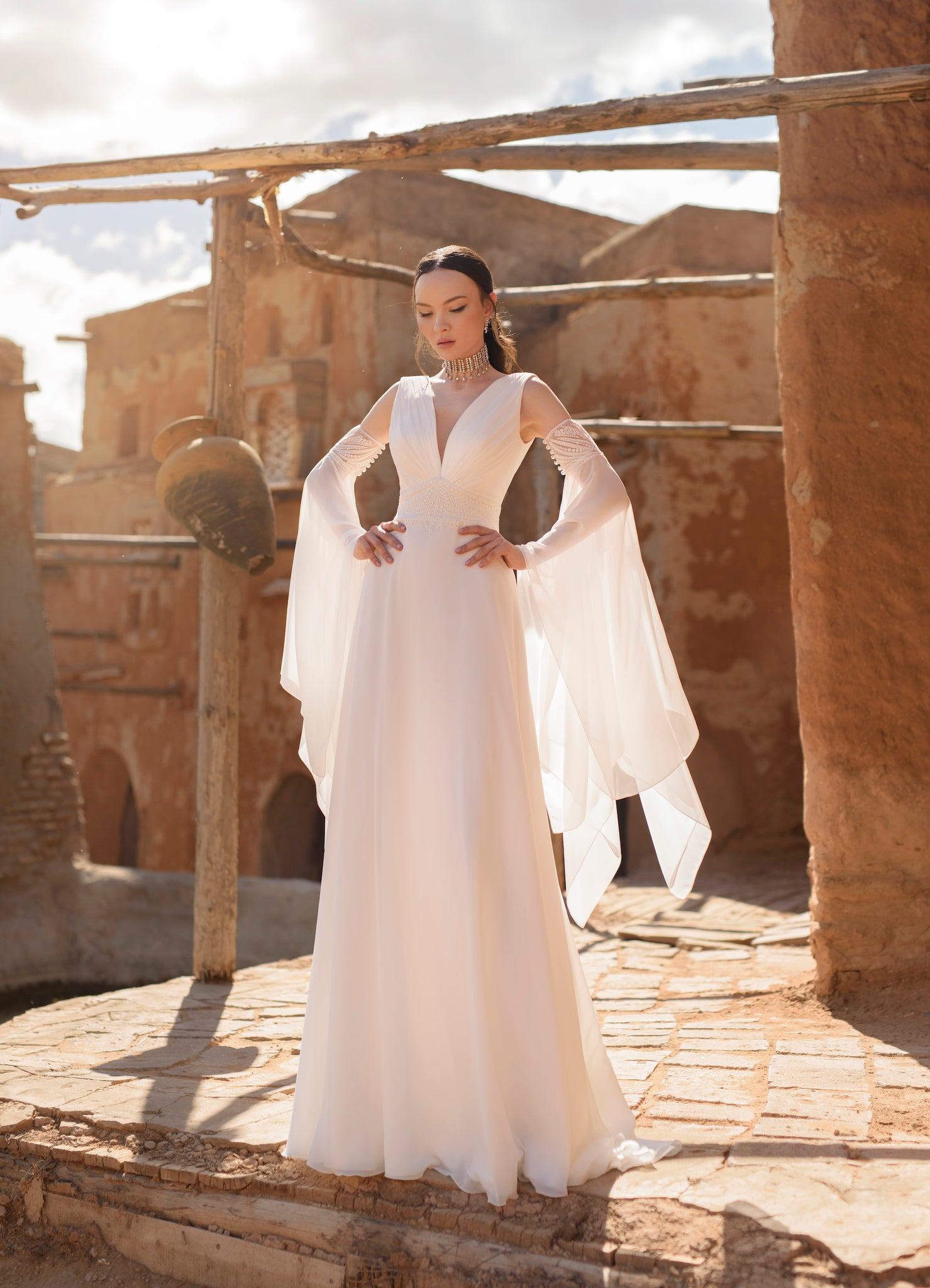 Odelice : la Robe de Mariée Empire à Manches Longues par Excellence.